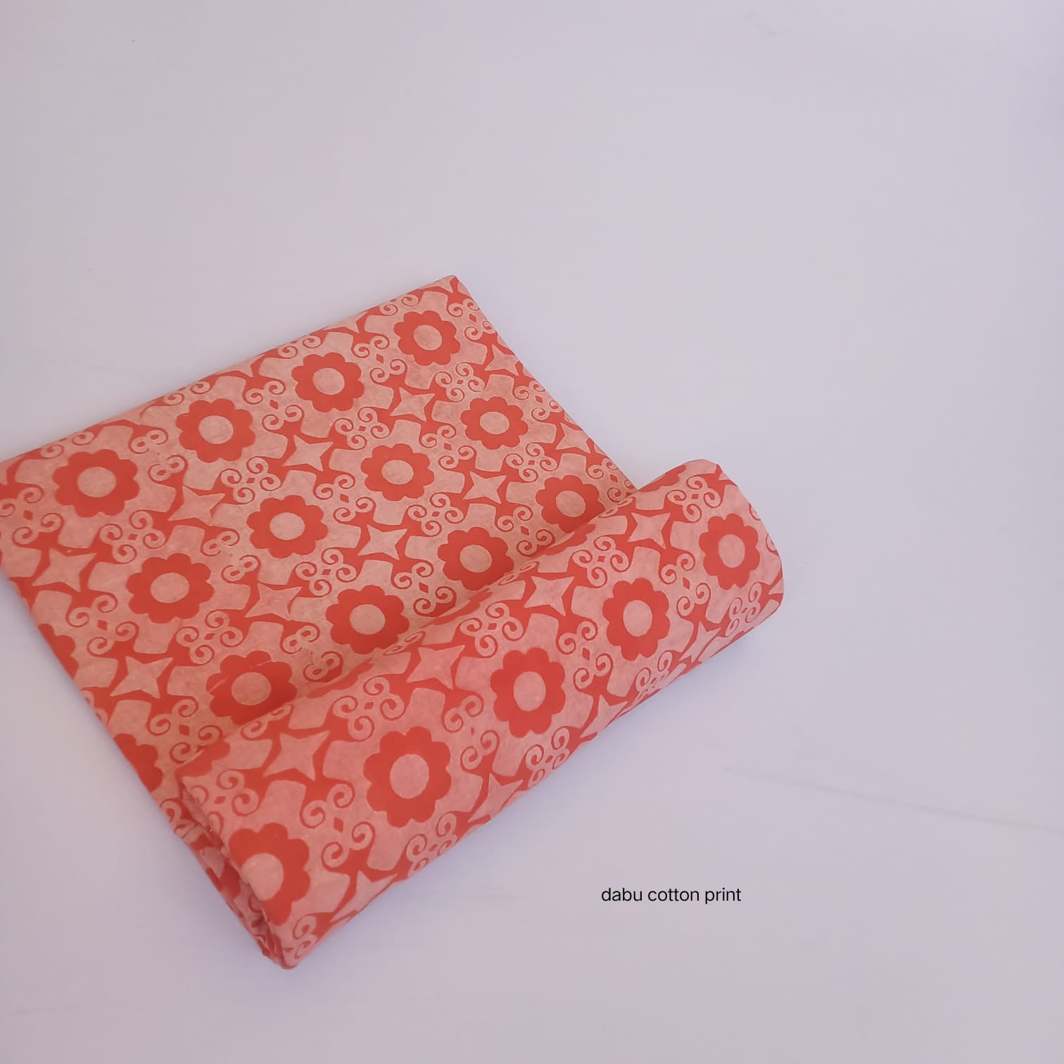 Orange coral floral jaal Dabu handblock cotton fabric Rajasthan craft